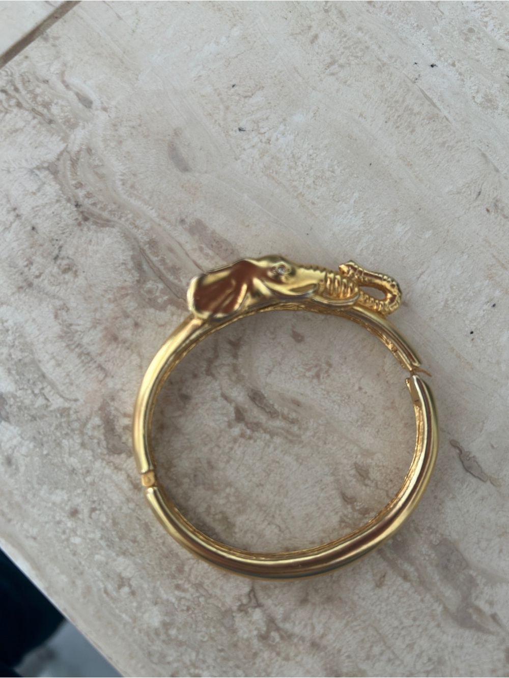 Bushed gold tone elephant heavy bangle bracelet